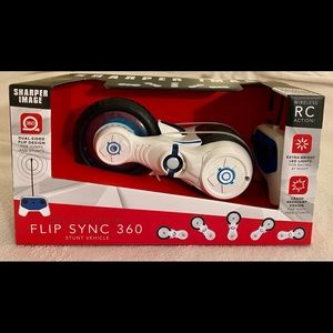 NWOT Sharper Image RC Flip Sync 360 Stunt Vehicle